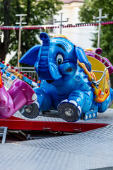 carousel with blue elephant, Children's attraction carousel, summer vacation