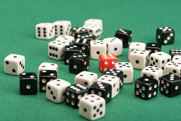 Dice, beautiful dice placed on green felt surface, selective focus.