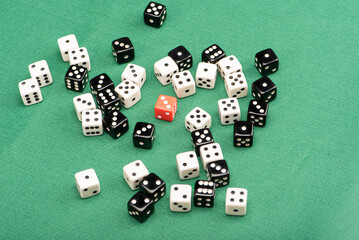 Dice, beautiful dice placed on green felt surface, selective focus.