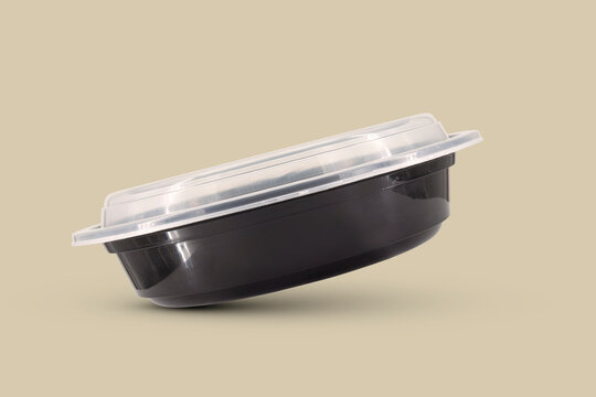A black rounded food tray Food Packaging Tray With Clear Plastic Cover mockup