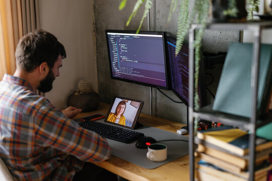 Remote talk. Facial expression. Coding. Cozy workspace. Employee