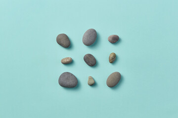 Natural pebble stones laid out as a square.