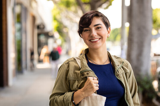 Happy Person Enjoys Shopping In Town