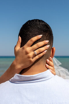 Newly Engaged Couple on Beach