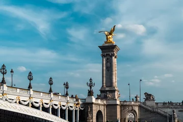 Papier Peint photo autocollant Pont Alexandre III Paris, France. April 22, 2022: Famous Alexander III Bridge with beautiful blue sky.