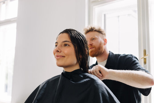 Hairdresser and Female Customer in Salon