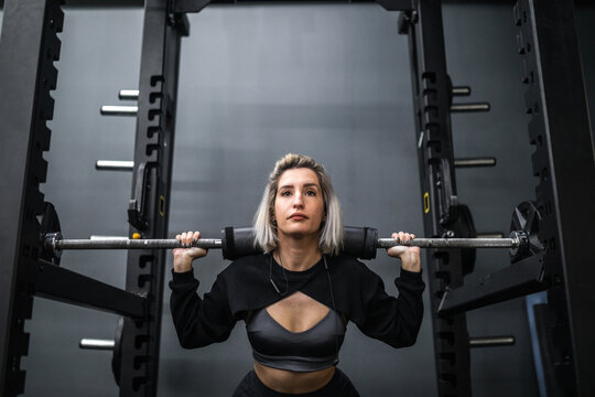 young woman training in a gym