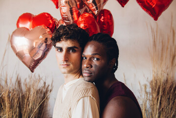 multiracial gay couple celebrating valentine's day