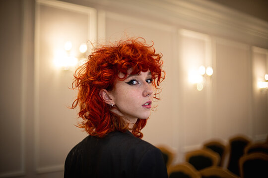Redhead beautiful woman indoors