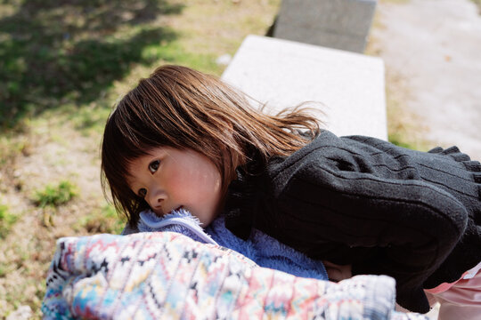 little girl rest  on the court