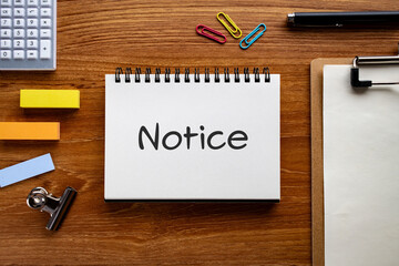 There is notebook with the word Notice. It is as an eye-catching image.