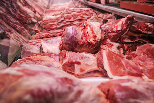 Assorted raw meat on stall in bazaar