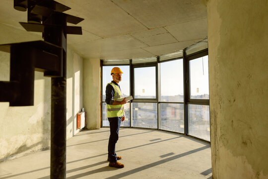 Inspect Builder Examine Construction Site 