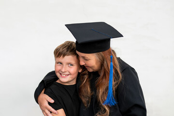 granny graduate hugging grandchild