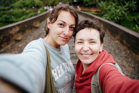 A couple of women on a journey portrait selfie