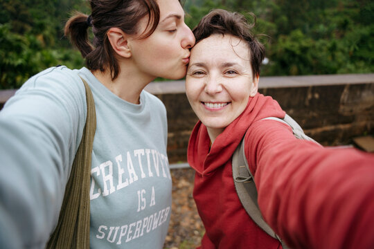 A couple of women on a journey portrait selfie