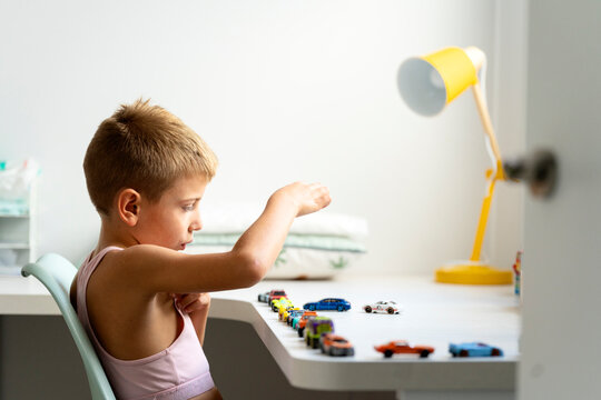 Kid playing with toys at home