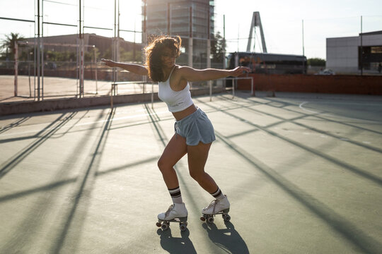 woman skating outdoors in the city