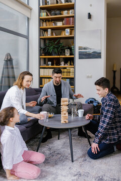 Jenga. Entertainment. Preparation. Family gathering. Warm atmosphere