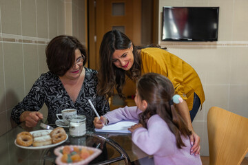 three generations of women at home