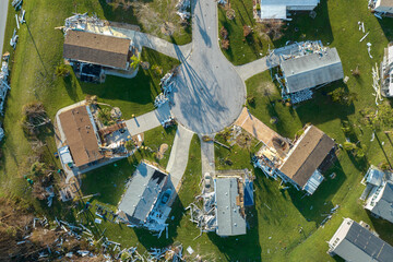 Property damage from strong hurricane winds. Mobile homes in Florida residential area with...