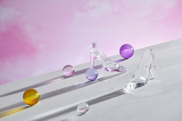 Little glass balls and high heels in direct sunlight