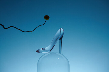 Crystal high heels stand balancing on spheres