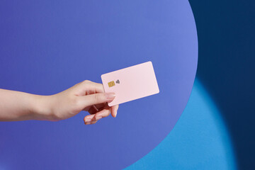 Hands holding plastic credit card for pay. This is Shopping concept