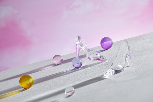 Little glass balls and high heels in direct sunlight