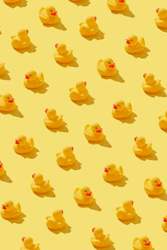 Stylish pattern with yellow rubber ducks.