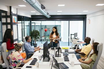 Diverse group of business people in a meeting in a modern office