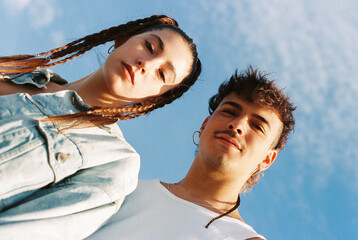 Young and modern couple at sunset