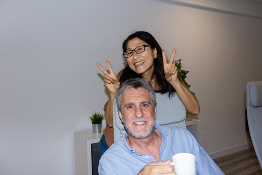 Funny Direct Flash Lo-Fi Photo Of Businesspeople having in the office