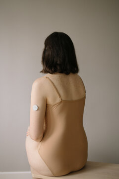 Diabetic woman with sensor