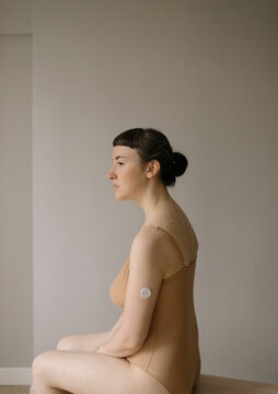 Diabetic woman with sensor