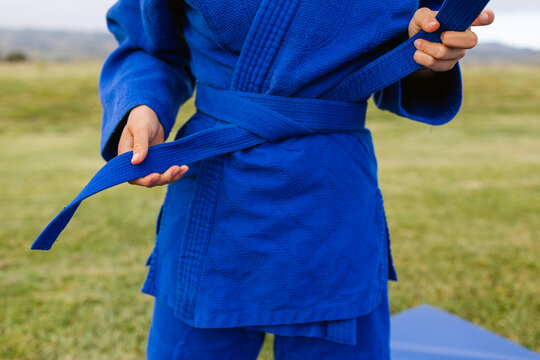 Judoka fastening belt body part