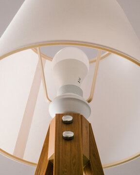 Energy-saving eco bulb in in a sleek bedside lamp 
