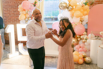 happy father / daughter dance during quinceanera 