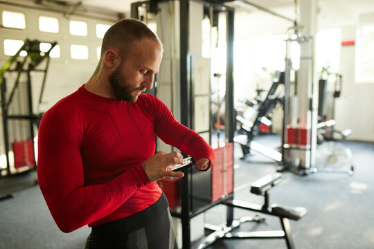 Portrait of a muscular man at the gym