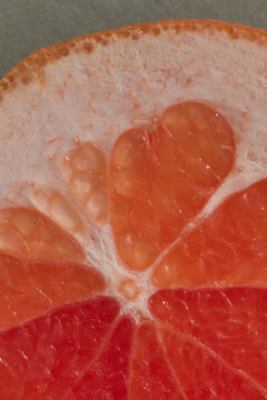 Vibrant Close-Up of Slice of Grapefruit