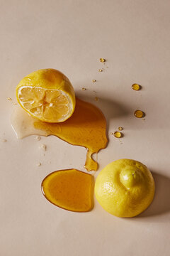 Lemon Halves with Honey Drizzles and Drops