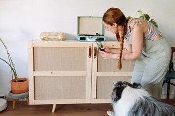 Woman taking photos with a smartphone