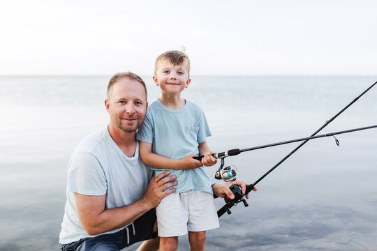 father and son fishing together