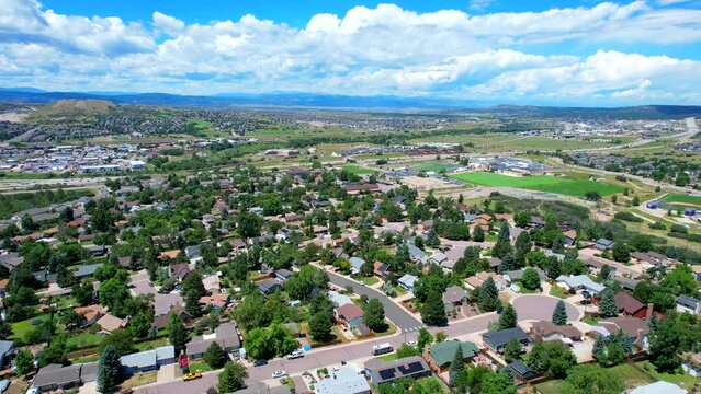 Drone flying over homes and neighborhood in castle rock, a suburb of Denver Colorado.