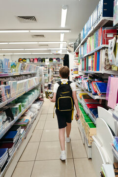 Faceless schoolboy getting ready to comeback to school.
