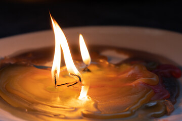 Melted candle. Colorful candle melted