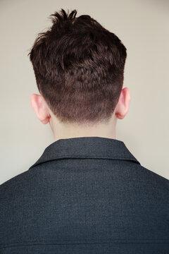Back view of hairstyle: man with short hair