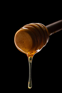 honey stick with dripping honey