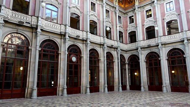 Courtyard of Nations, main hall of Palacio da Bolsa in Porto, Portugal. Pan left