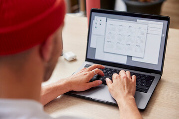 Man working on portable laptop